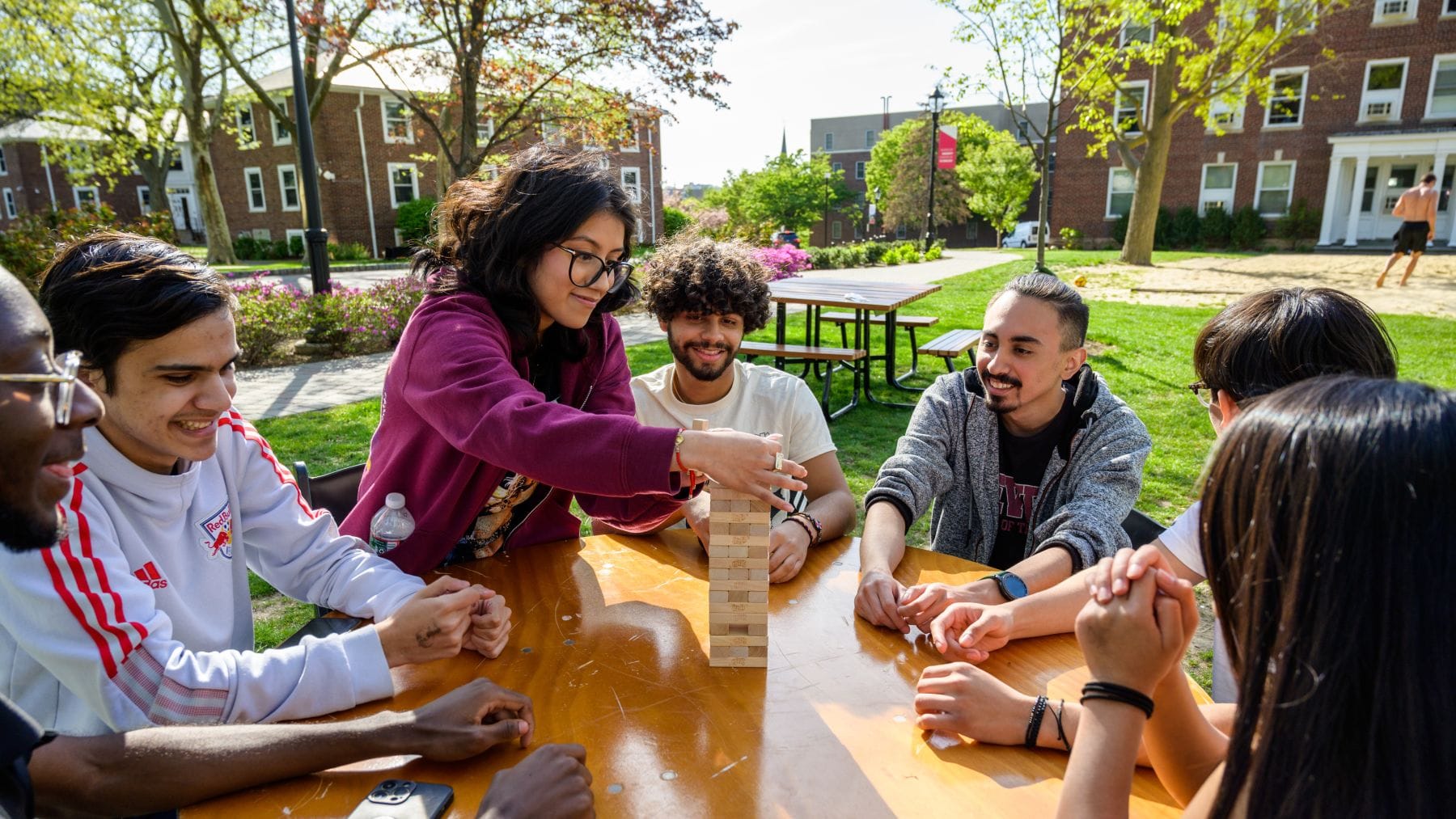 Students gather to play a game outside