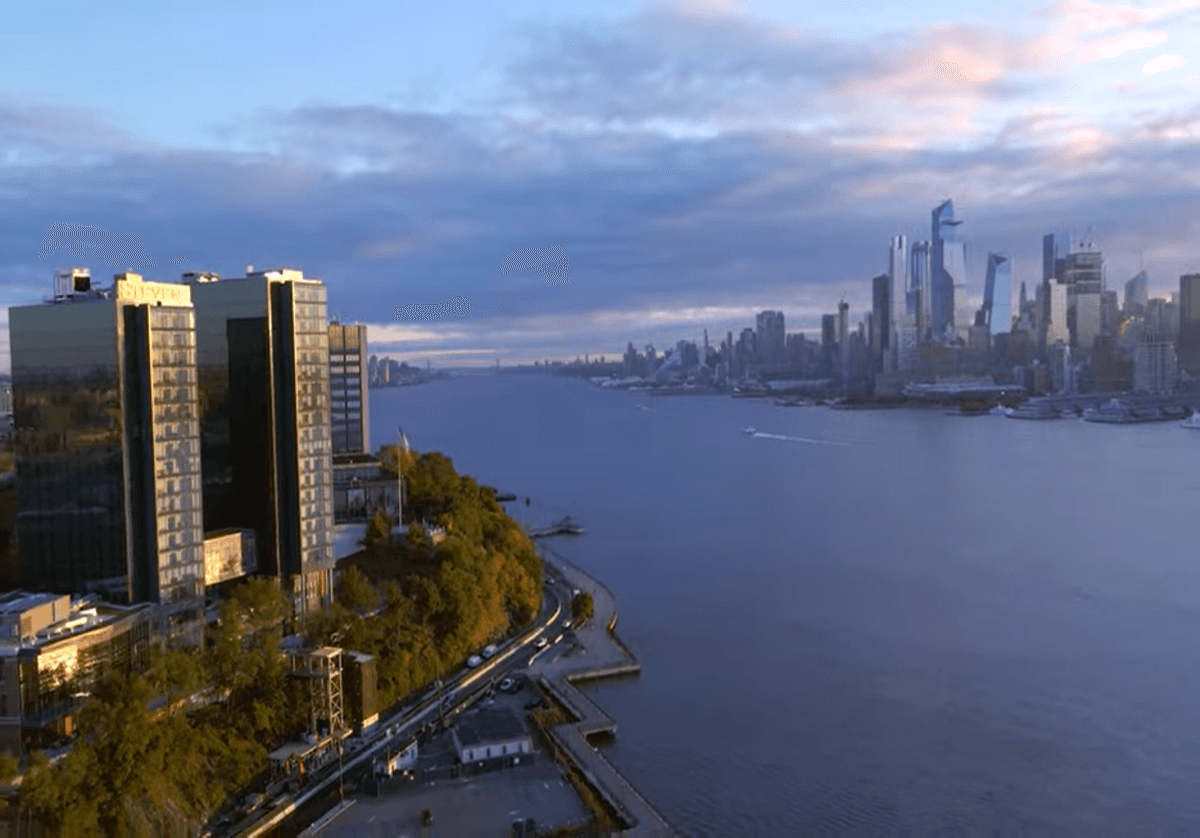 a shot of the UCC and midtown NYC along the Hudson River