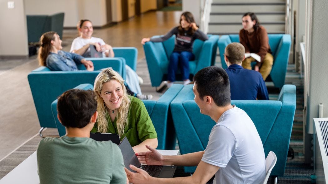 Students sitting and talking in the UCC