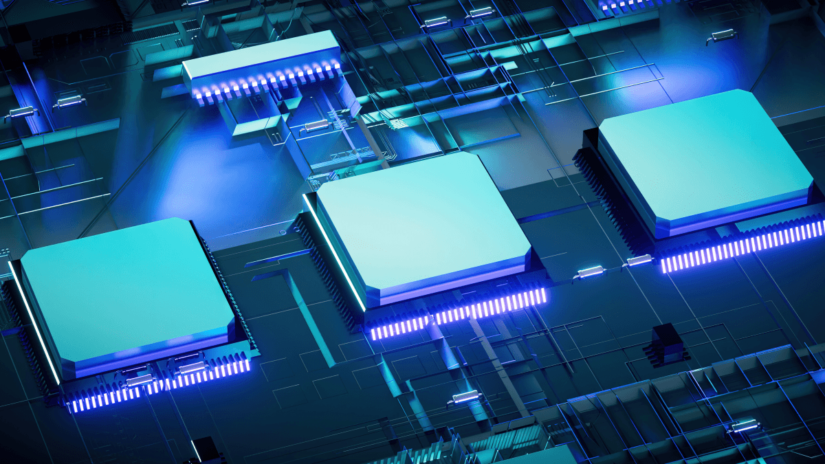 Three computer chips on a circuit board, all in blue