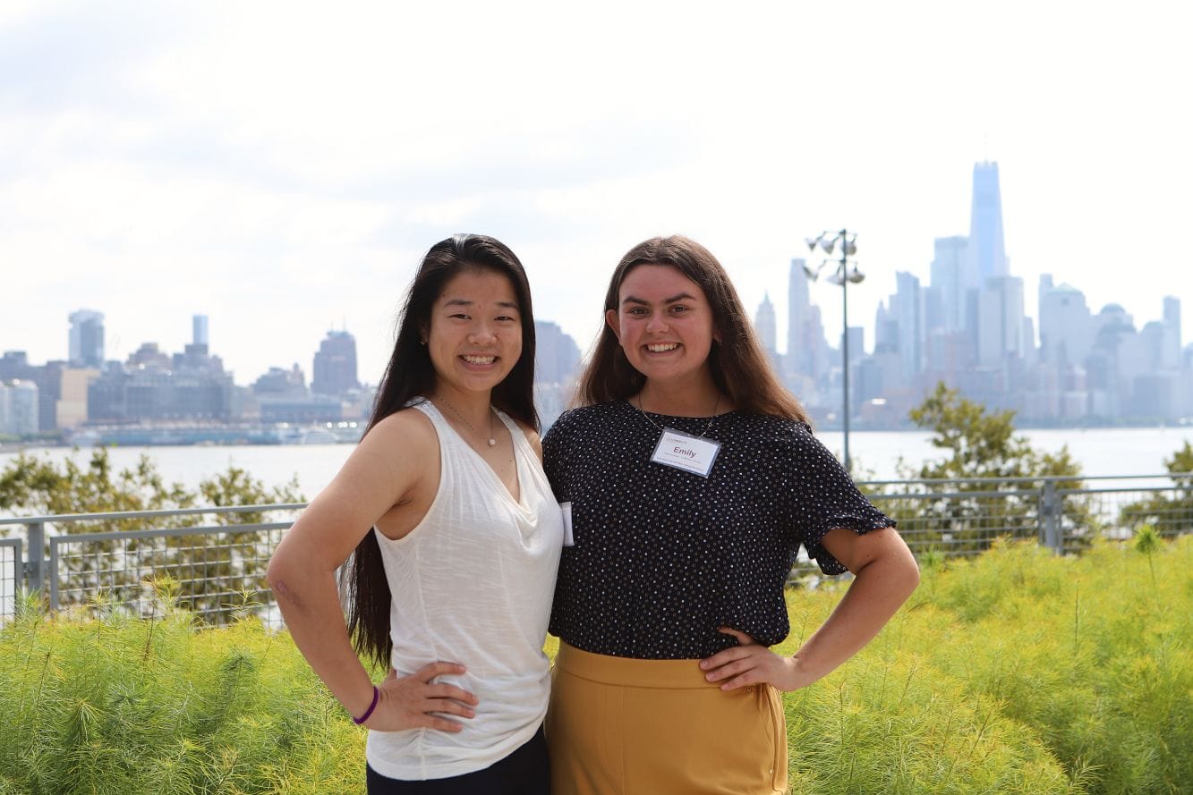 two students smiling