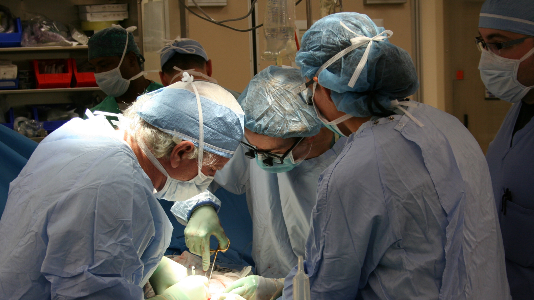 Photos of doctors performing surgery