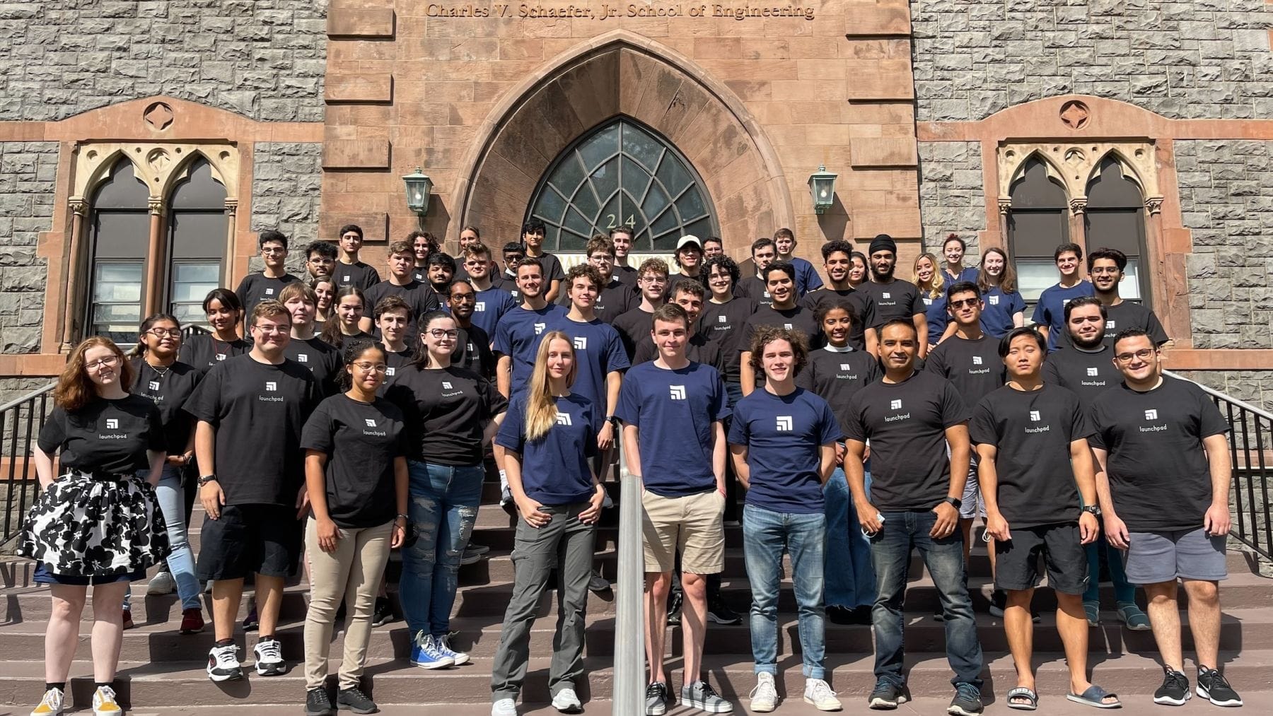 Large group of students in front of Stevens building