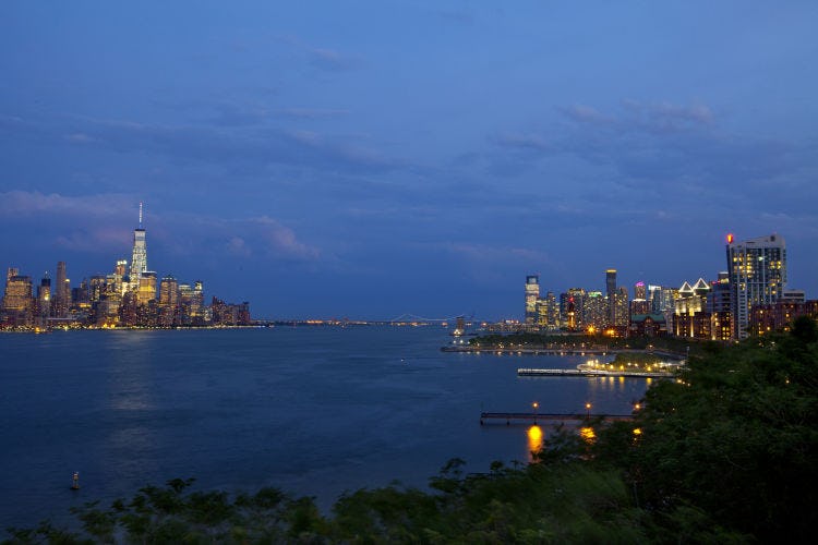 A view of lower Manhattan and the Freedom Tower across the Hudson River from Stevens Institute of Technology Hoboken campus.