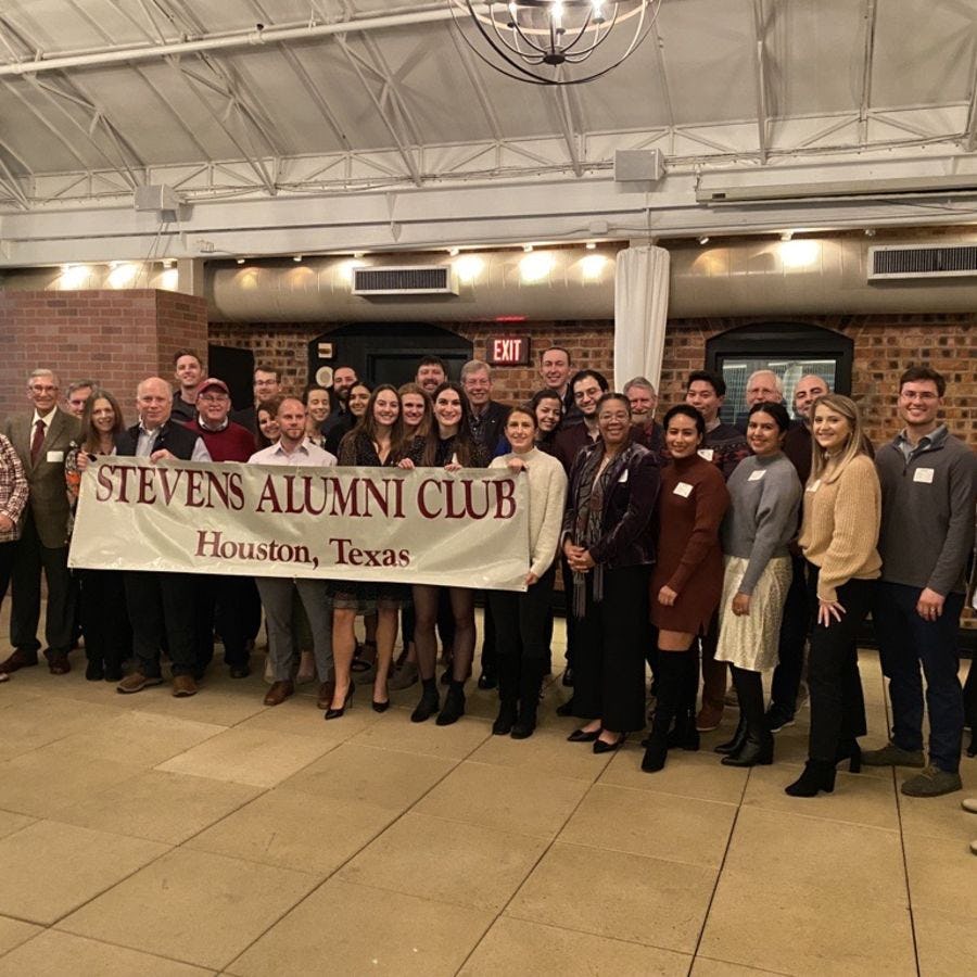 Alumni gather at the Houston Alumni Network Holiday Party in 2022