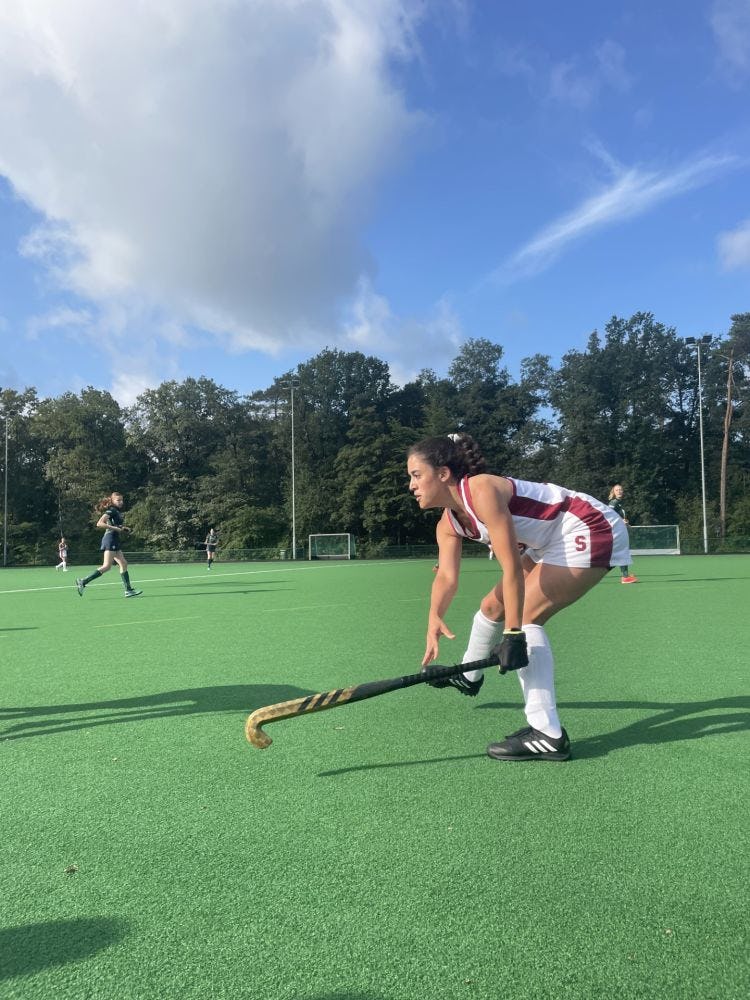 Stevens field hockey player practices on the field