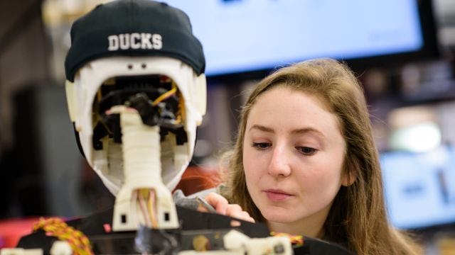 A student working on a robot 