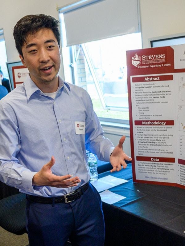 Students explains his research at the Innovation Expo