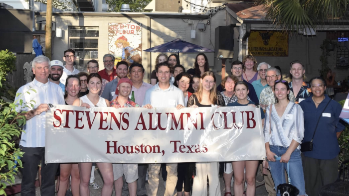 Houston Alumni Network poses for a group photo